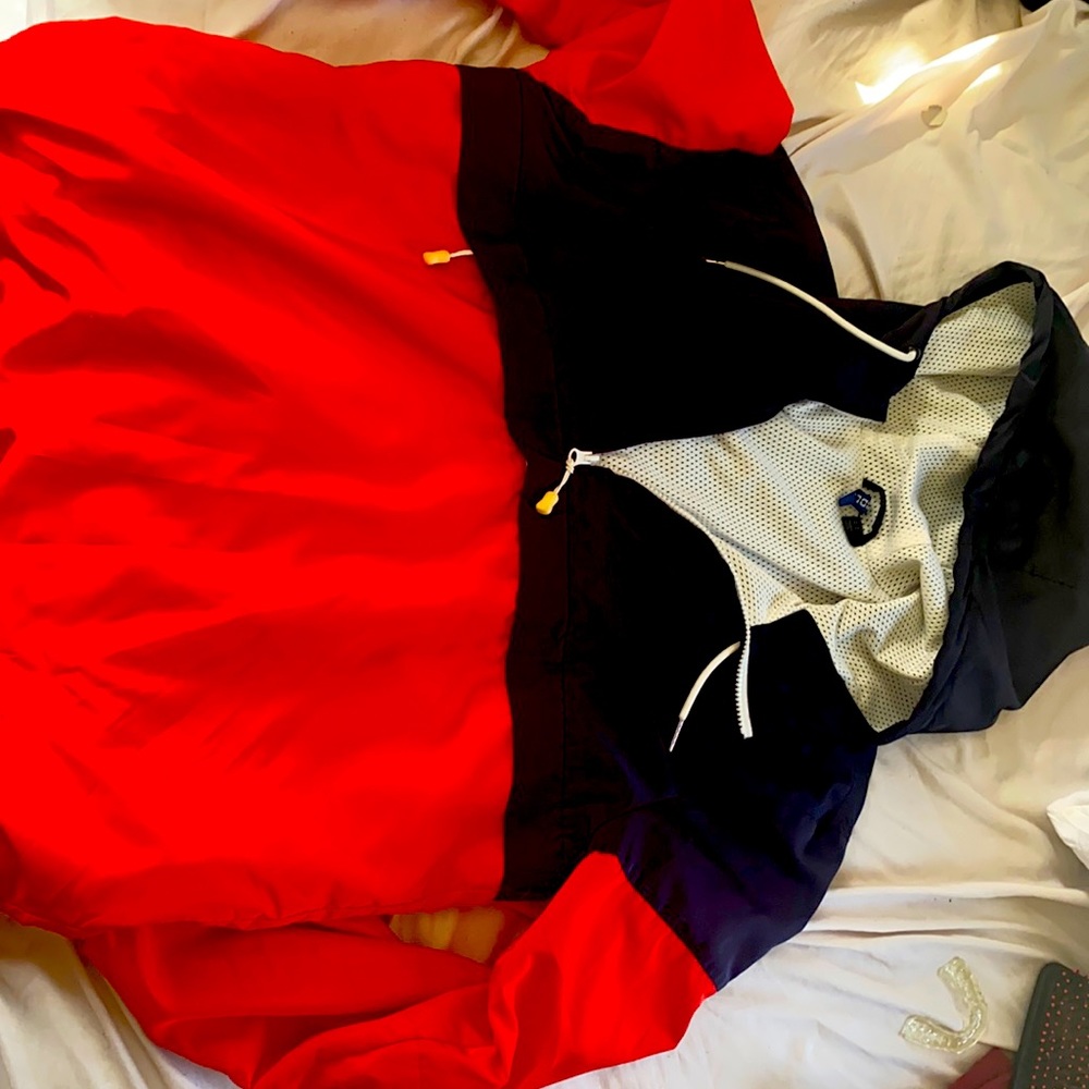 Navy blue and red windbreaker